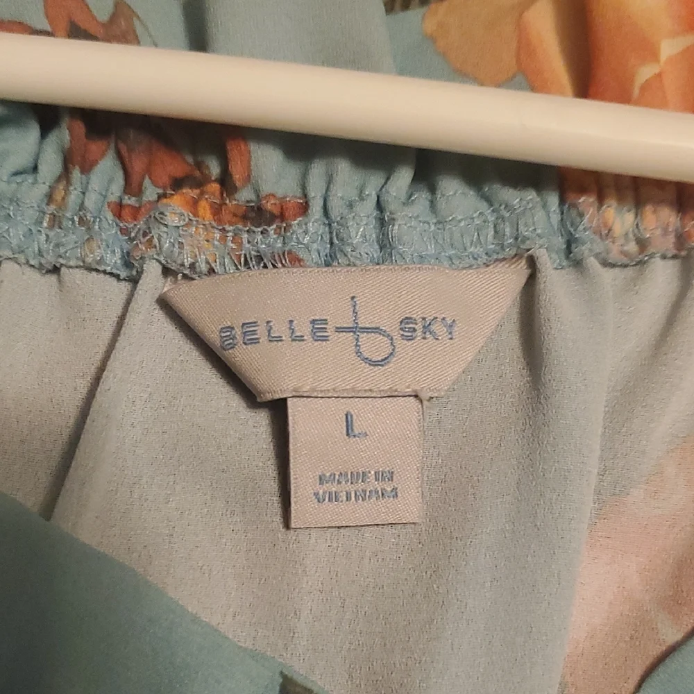 Elegant Blue Floral Blouse with Subtle Charm - Picture 2 of 5